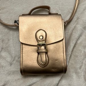 Cute, small gold crossbody purse